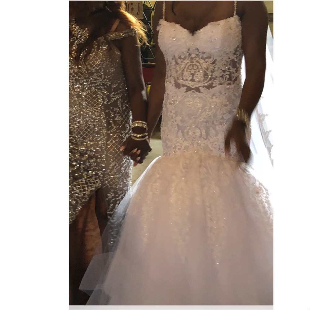 Wedding dress by Eve of Milady